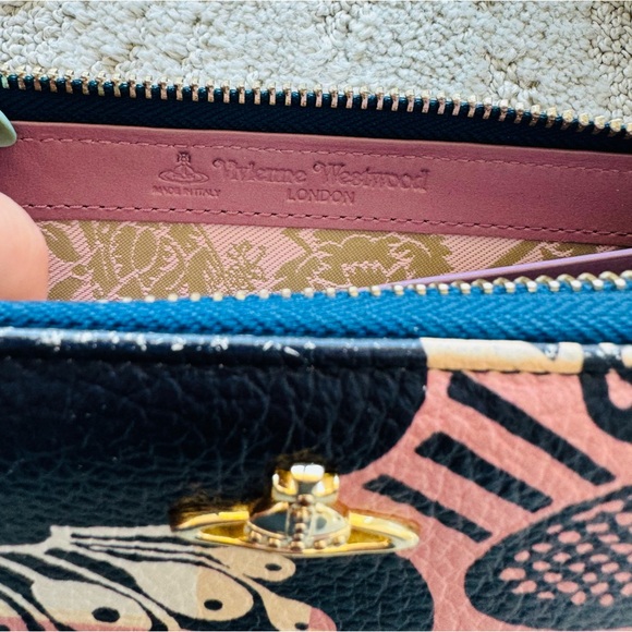 VIVIENNE WESTWOOD โ Zip around Wallet โ Box Included โ Great Condition โ - Picture 9 of 16